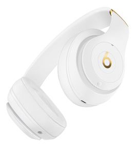 white and gold wireless headphones